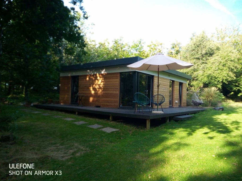 Two Bed Modular Garden Home With Decking In Tree Shade